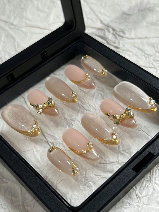 Cat Eye Almond Press-On Nails with Gold Edges & Bows