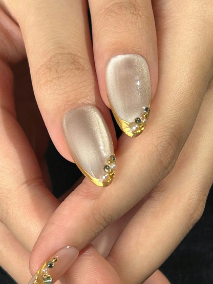 Cat Eye Almond Press-On Nails with Gold Edges & Bows