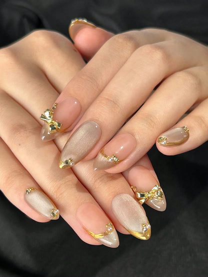 Cat Eye Almond Press-On Nails with Gold Edges & Bows