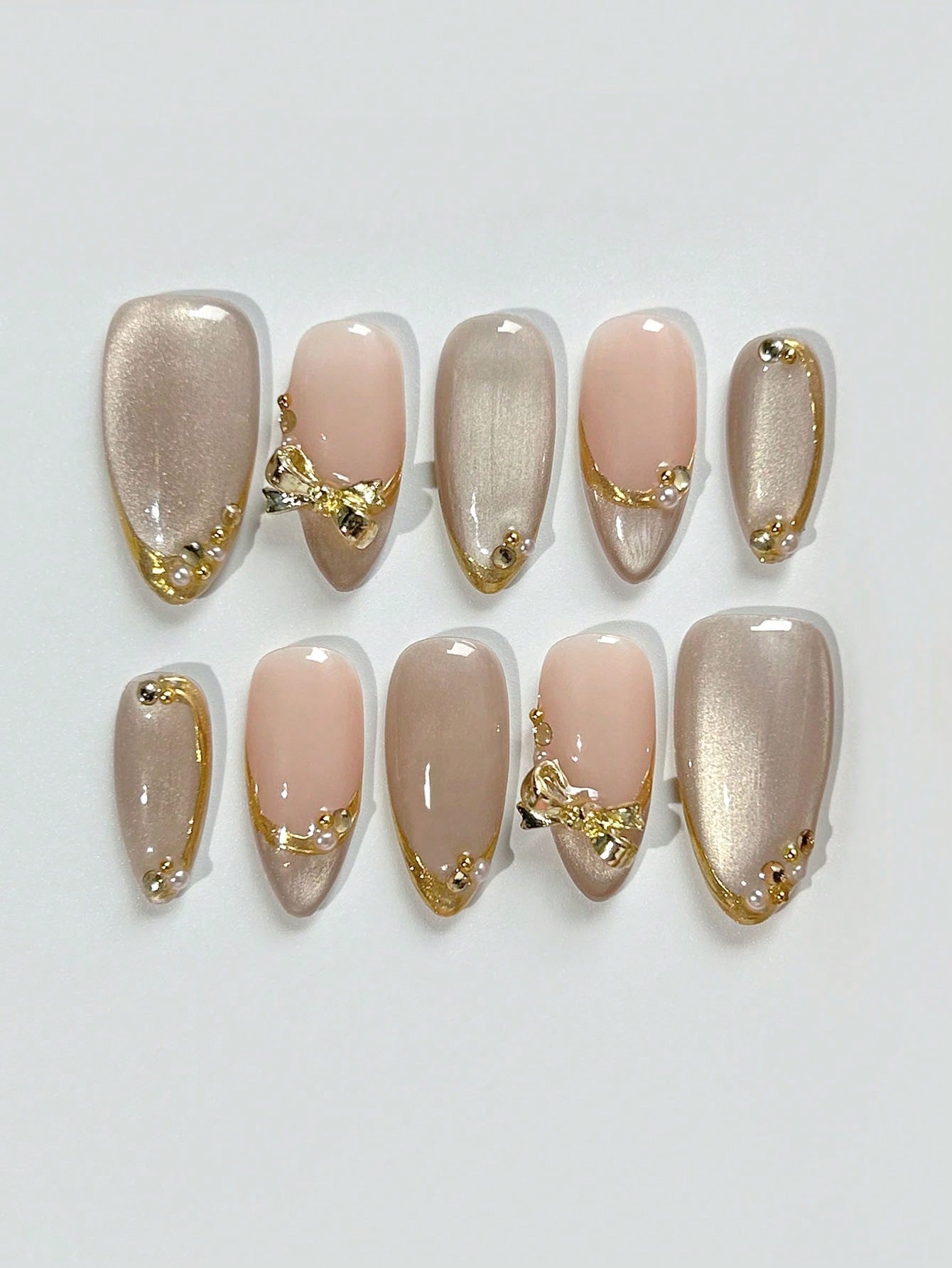 Cat Eye Almond Press-On Nails with Gold Edges & Bows