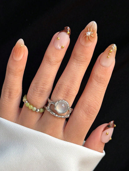 Amber Cat Eye Almond Press-On Nails with 3D Sun