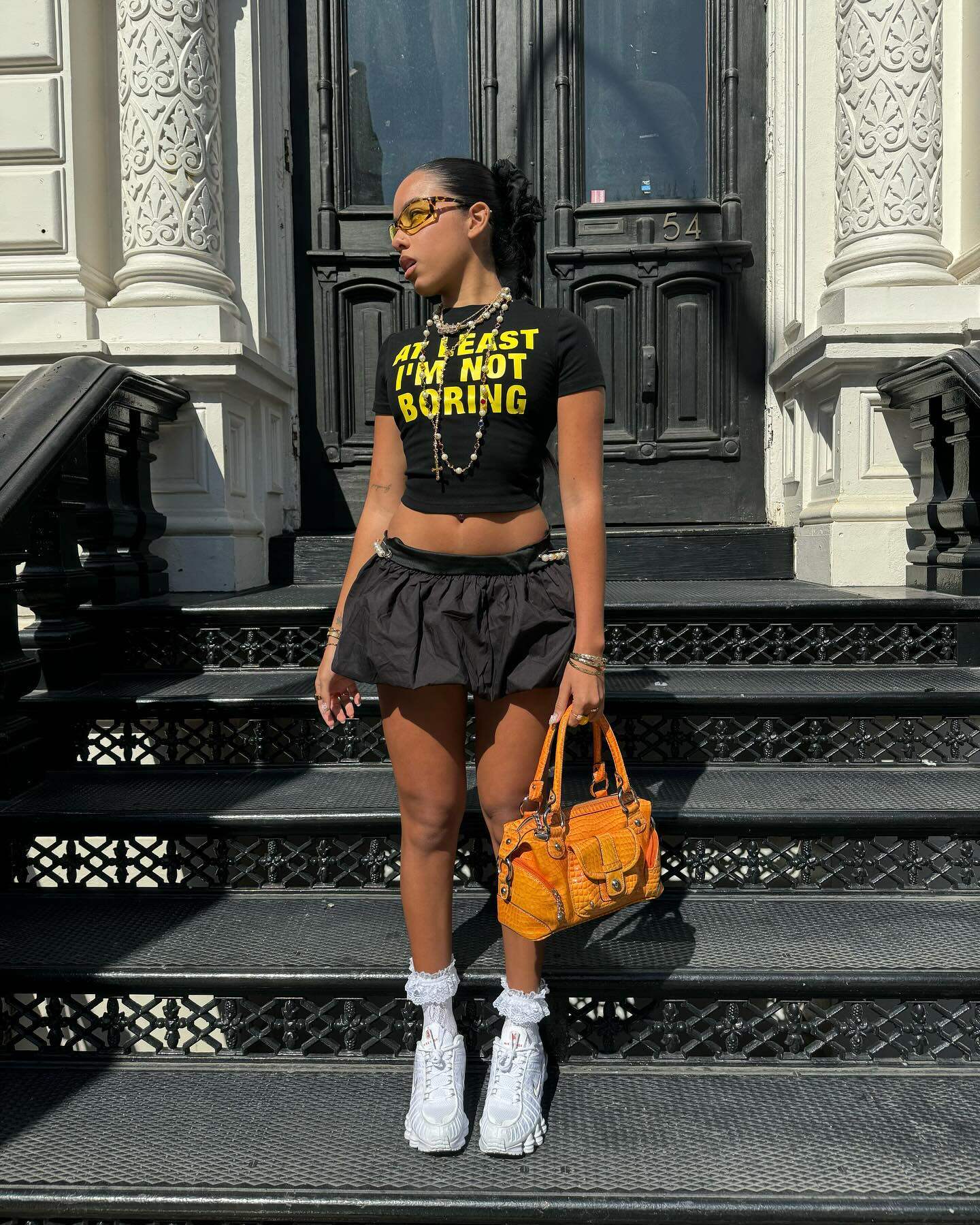 At Least I'm Not Boring Graphic Black Baby Tee